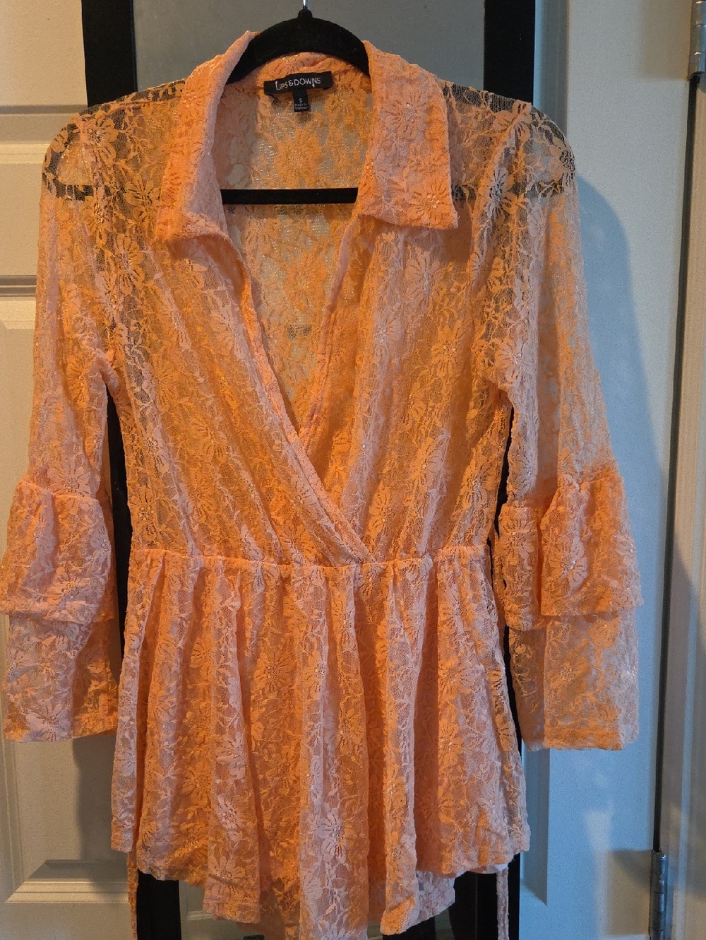 Lace Peach Romper with V-Neck and Peplum Waist